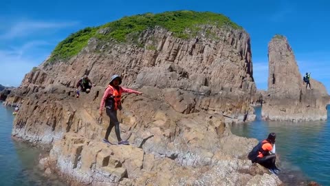 Watching at Guan Gong Knife cave area in the Basalt Island in Hong Kong