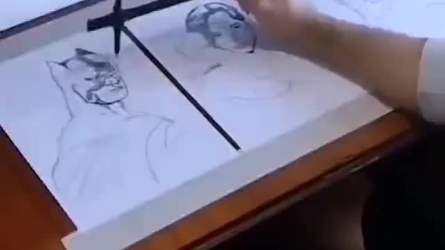 This artist is very good at painting three pictures with one hand
