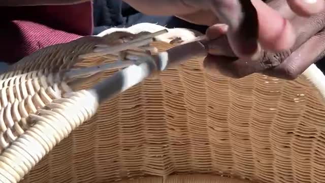 How we weave rattan bassinets.