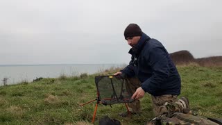 Packing away the Trekology Yizo go camping chair.