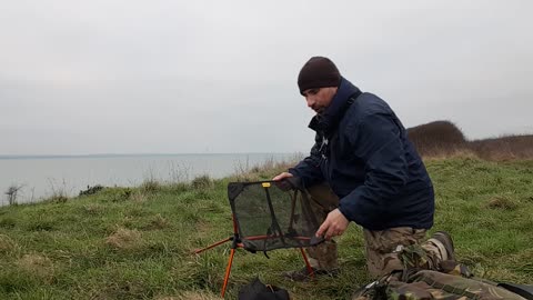 Packing away the Trekology Yizo go camping chair.