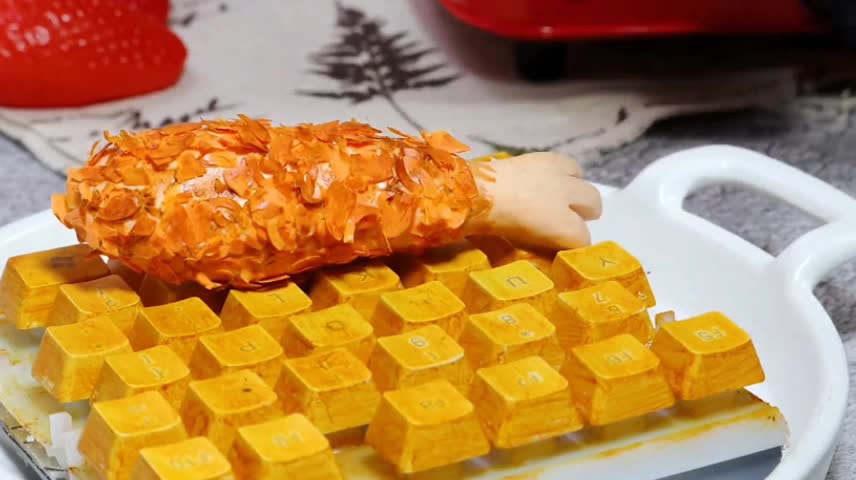 Over budget, tablet 'keyboard model chicken leg cake'