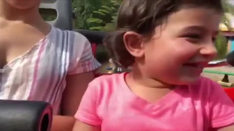 Little girl has hilarious reaction riding roller coaster for the first time