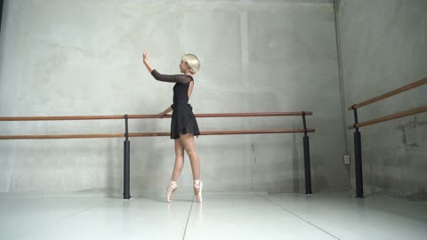 Beautiful Ballerina Practicing her Moves