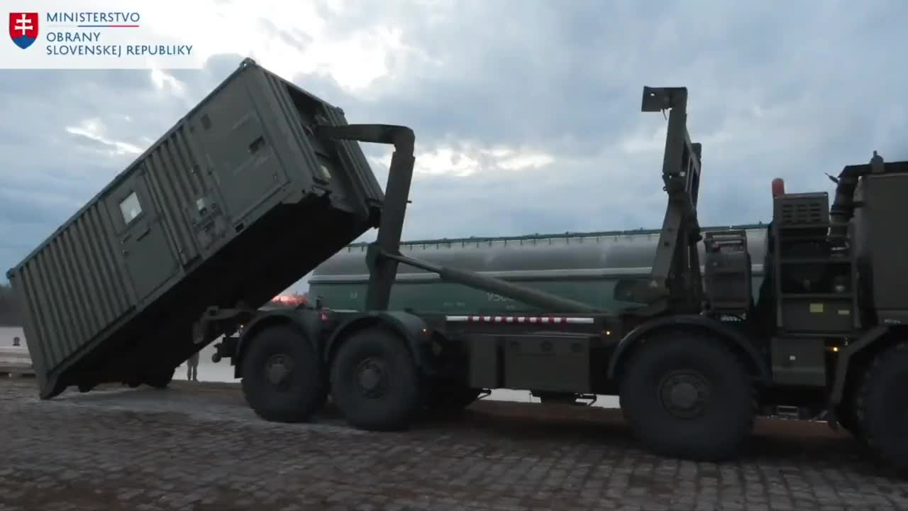 Loading and sending Slovak S-300PMU air defense systems to Ukraine.