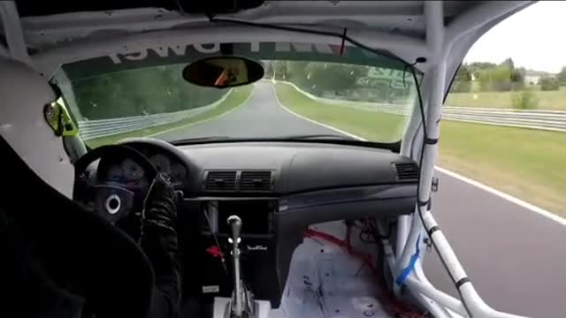 The first view of racing driver driving a racing car shows how to repair a car.