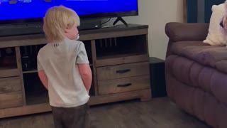 Goldendoodle Keeps Kid Off Couch