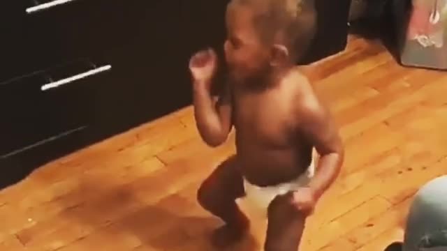 Baby boy participates in 'shoot dance challenge'