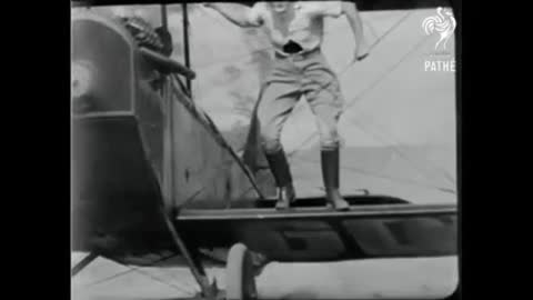 WOMAN CHANGES AIRPLANE WHEEL MID-FLIGHT IN 1926