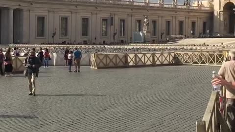 A huge line of people at the main square of the Vatican