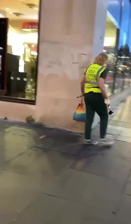 Guy smashes HSBC bank windows