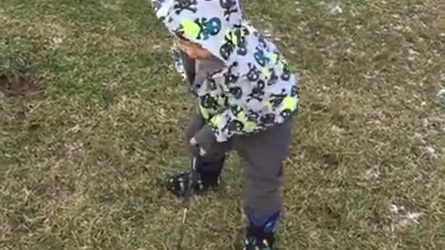 Toddler fails at golf swing