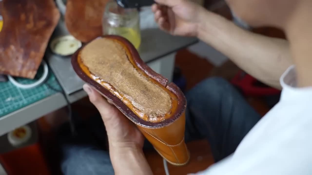 42 The process of making handmade work boots oldest