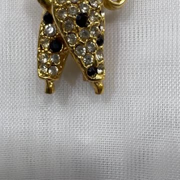 18KGP Poodle with Umbrella Brooch (2” x 0.75”). Made with Swarovski Crystal