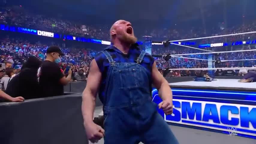 Brock Lesnar lays waste to Romain regins and the Usos smackdown