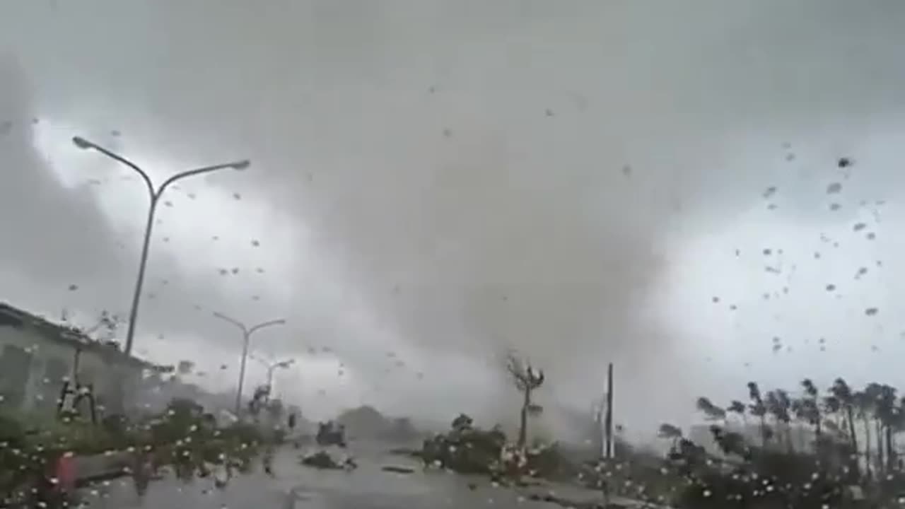 Woman Appears to Be Thrown Out of a Tornado