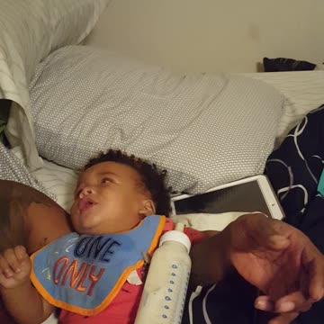 Baby Girl Spills Her Milk Everywhere Just As Dad Starts Singing To Her