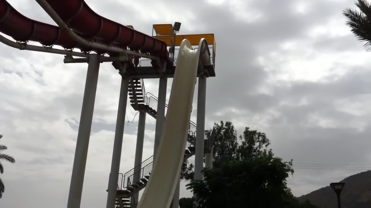 Daredevil performs insane water slide jump