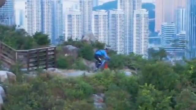 Riders ride in the back hills of the city