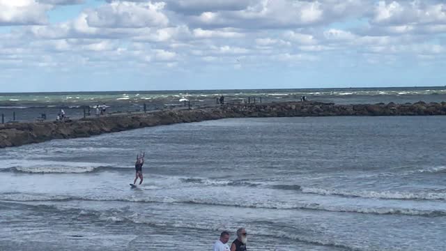 Kite Surfer Flies Through the Air