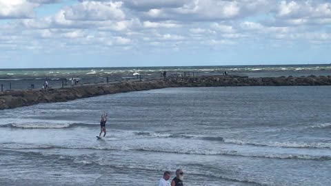 Kite Surfer Flies Through the Air