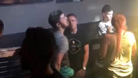 Music guy dancing at bar weirdly with friend