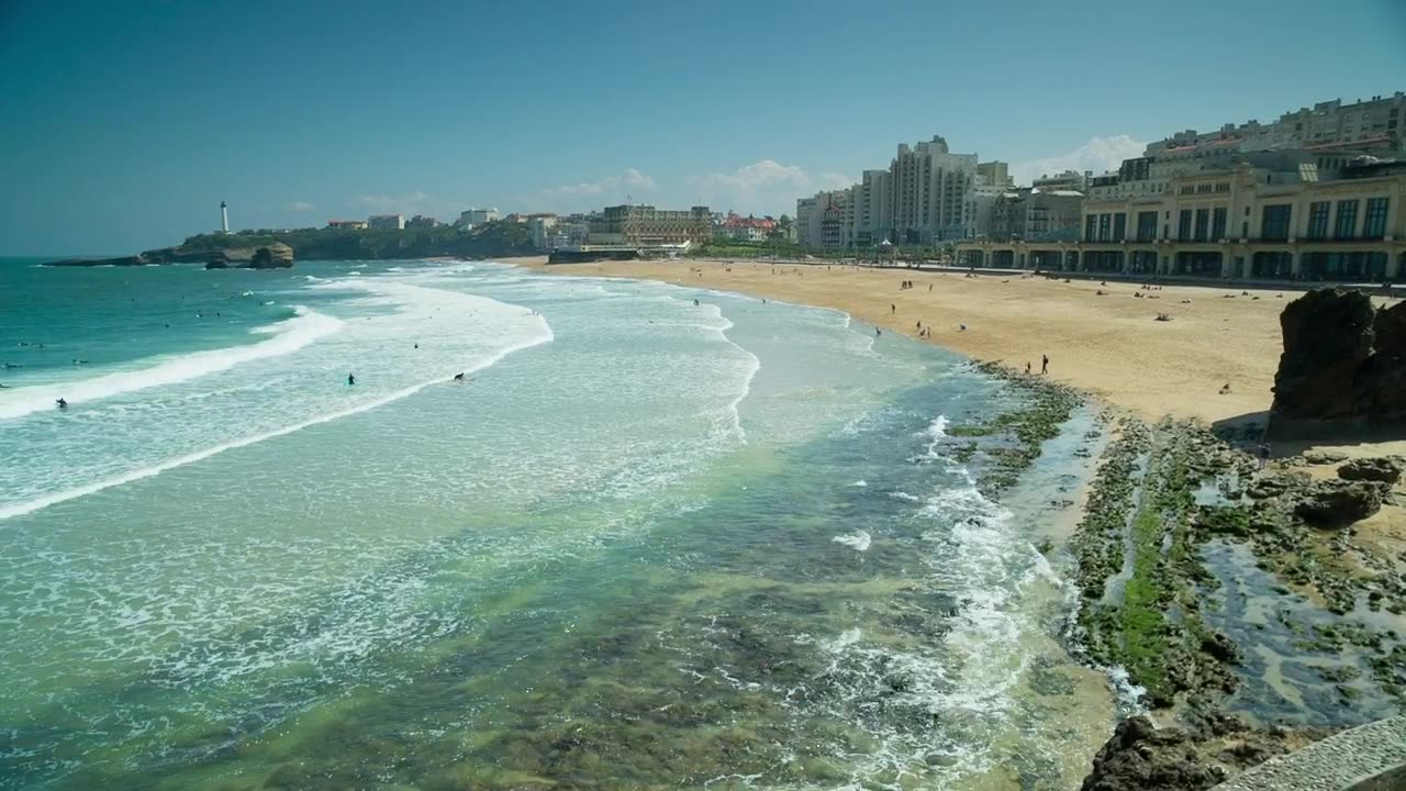 ocean waves bursting on the shore of the coast