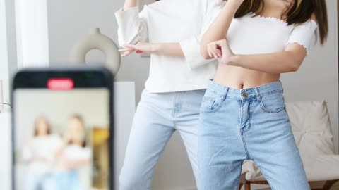 Two Women Making A Dance Video