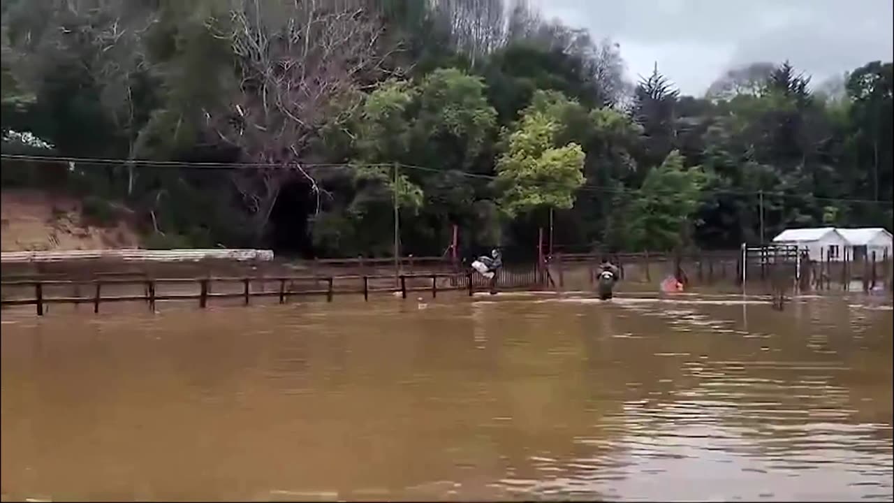 Chileans evacuate after heavy rainfall floods streets