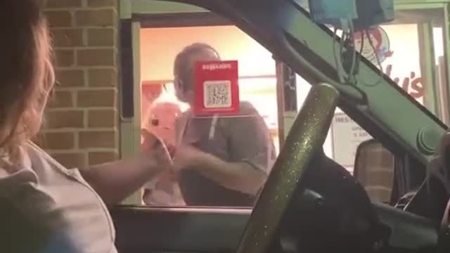 Snatching food at a drive thru