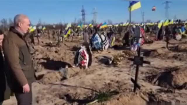 French Ambassador to Ukraine Etienne de Ponsin at the huge cemetery of the graved AFU soldiers