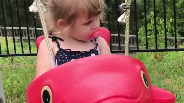 Aussie baby 🥰enjoying dolphin swing