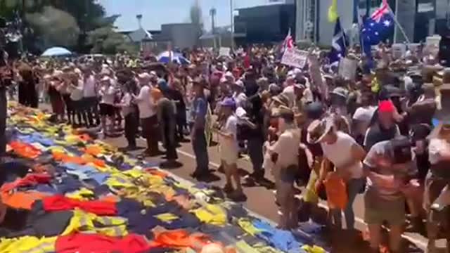 Powerful scenes of Patriots in Australia laying down their work uniforms on the steps of parliament.