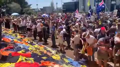 Powerful scenes of Patriots in Australia laying down their work uniforms on the steps of parliament.