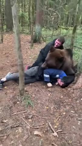 Couple of Russians horsing around with their pet 😂