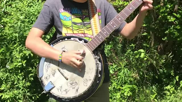 Gianluca on the Banjo - Cotton Pickin Kids