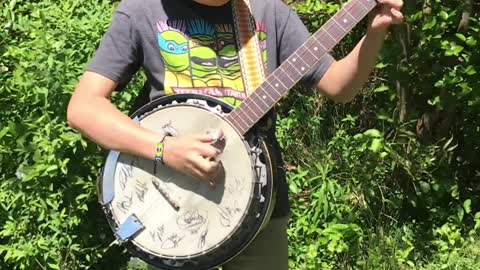 Gianluca on the Banjo - Cotton Pickin Kids