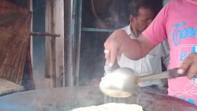 Indian Guy Making Street Food Bread