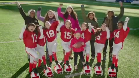 Girls playing football/Budweiser brewing with wind power