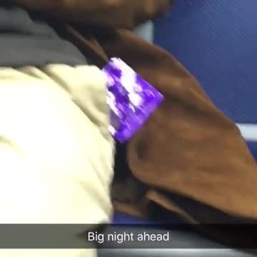Big night ahead man with purple condom in pocket