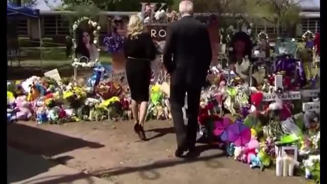 Bidens arrive at Texas elementary school shooting site, lay flowers to victims