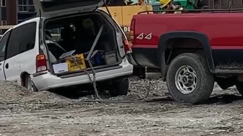 Using Seat Belts to Tow a Car
