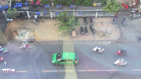 After Breakfast Street Food Rush view from 4th floor Hotel Minh Kieu, My Tho, Vietnam