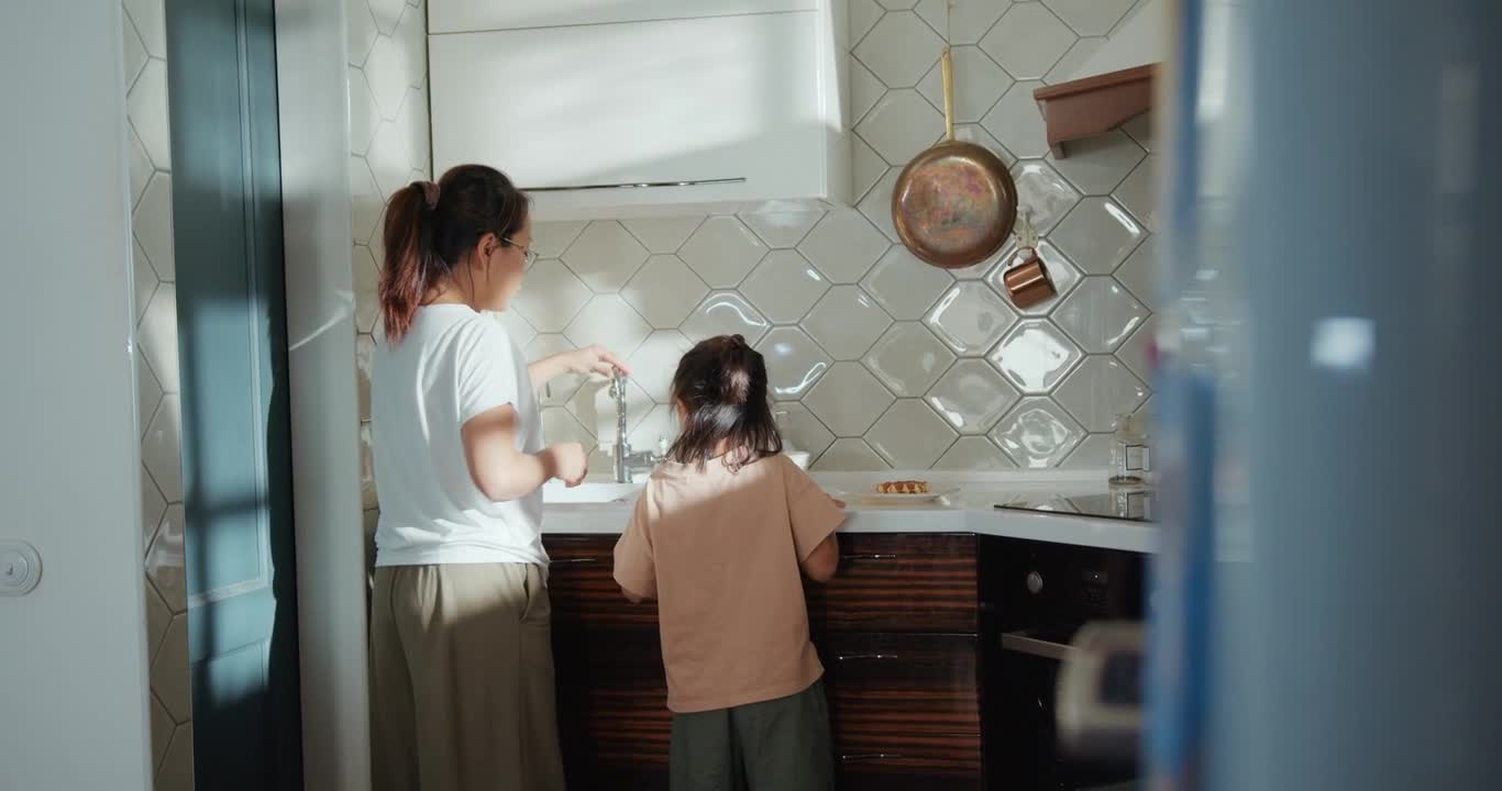 a mother supported by her daughter