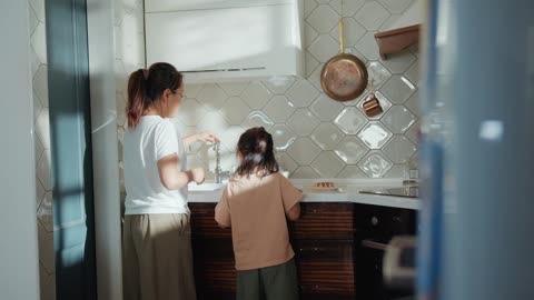 a mother supported by her daughter