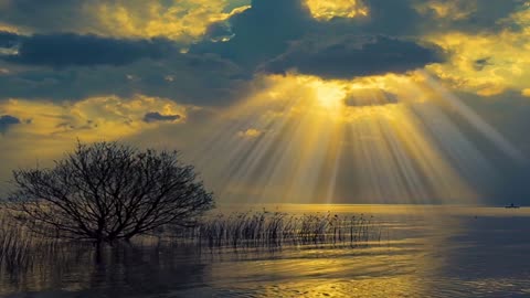 Lights through dark clouds.