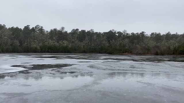 Windy winter pond.