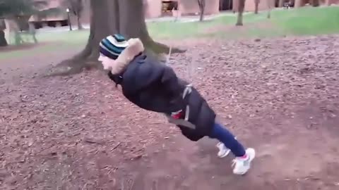 the cuteness of the child when playing on the swing and finally falling Live translation