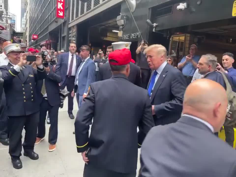 Donald Trump greeted by first responders at Ground Zero