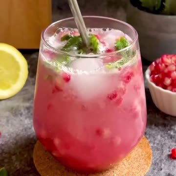 "Sip on Summer Bliss with the Sparkling Virgin Pomegranate Mojito!"